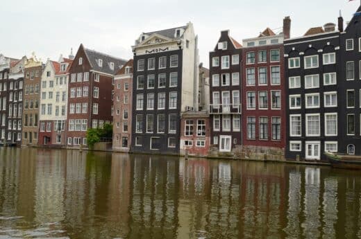 Layover in Amsterdam photo of the gingerbread homes by the canals in Amsterdam.