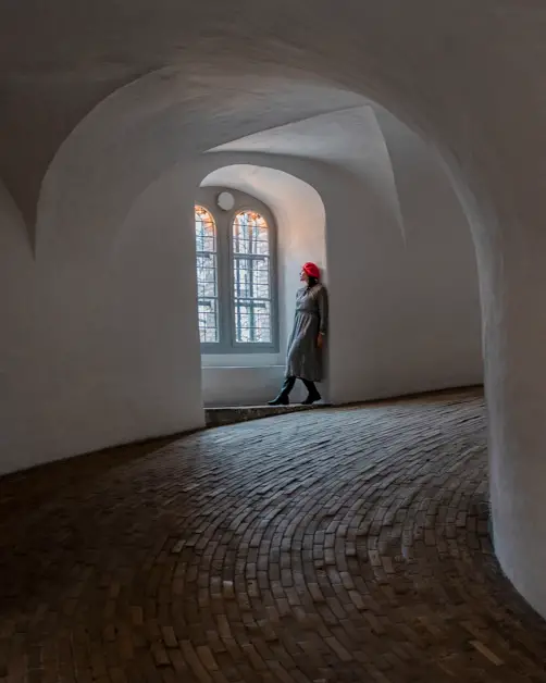 Me looking out the window at the Round Tower in Copenhagen