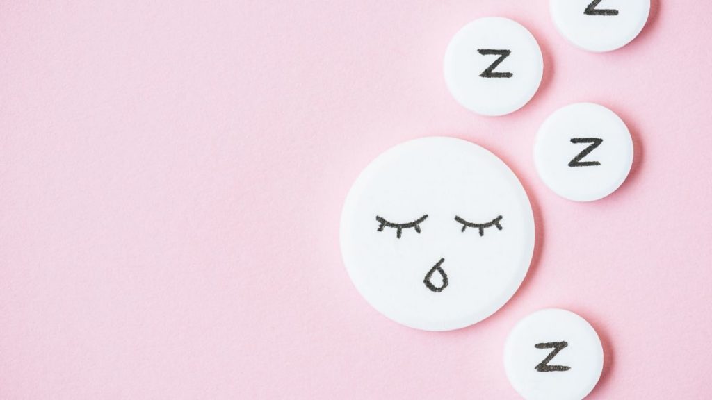 picture of circles with a sleepy face and zzz's 