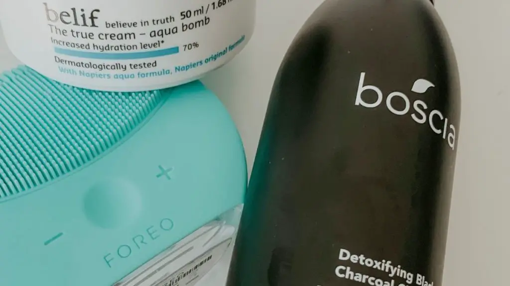 picture of face wash and a FOREO luna to show how to take care of your skin while traveling
