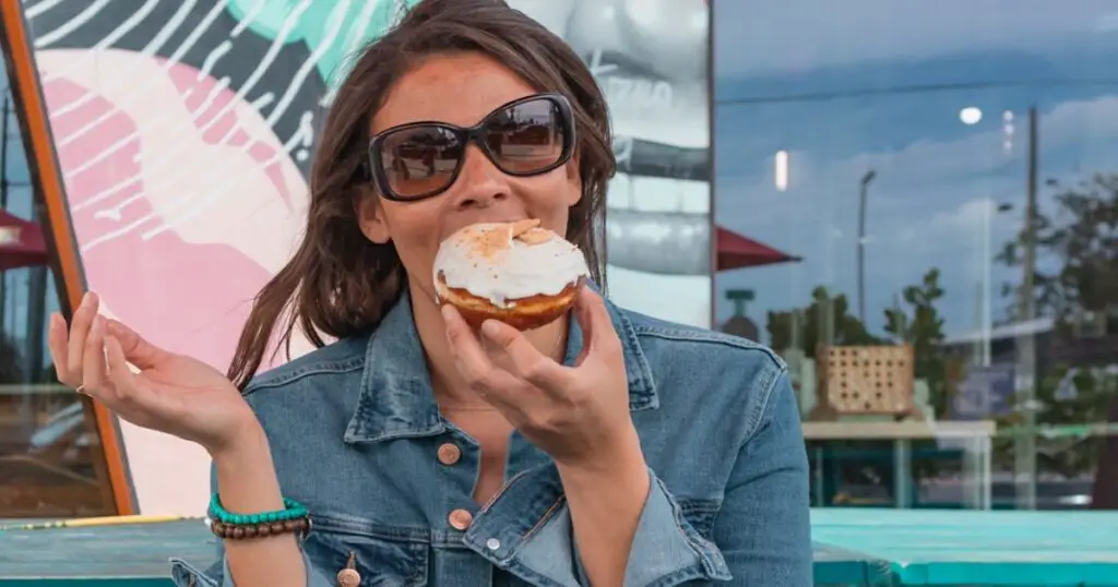 me eating a donut from The Salty Donut one of the top restaurants in Miami