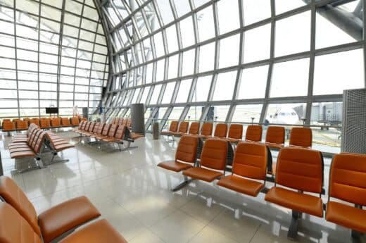 Things to do at the airport photo of an empty airport gate.