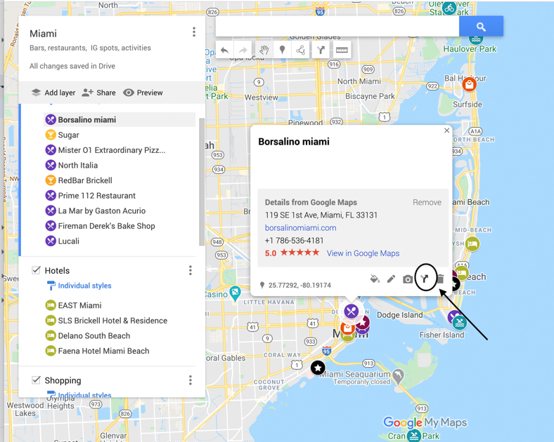 Arrow showing how to get driving directions in Google Maps trip planner. 