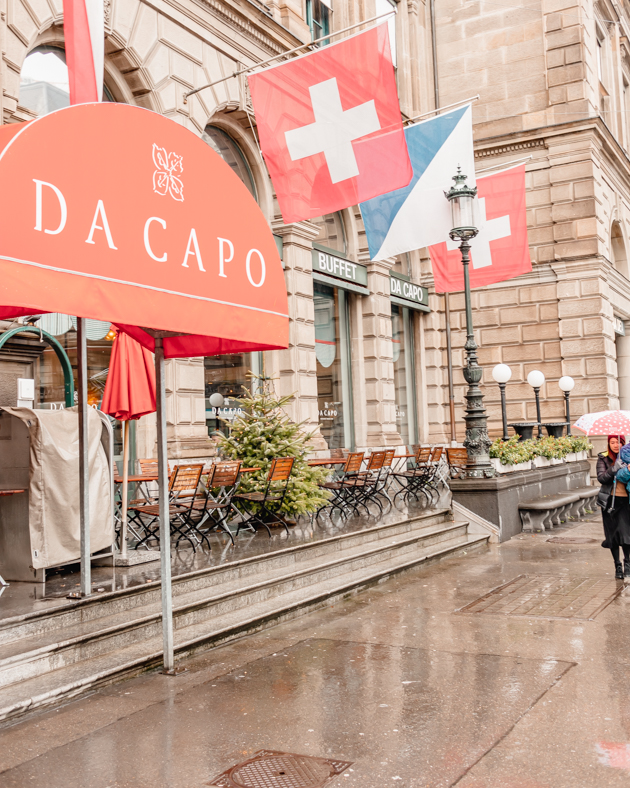 Picture of a cafe in Zurich with the Zurich flag