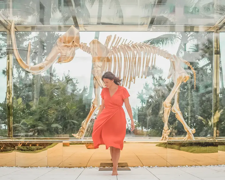 Me standing in front of the gold plated woolly mammoth at Faena Hotel. One of the most insta worth places in Miami.