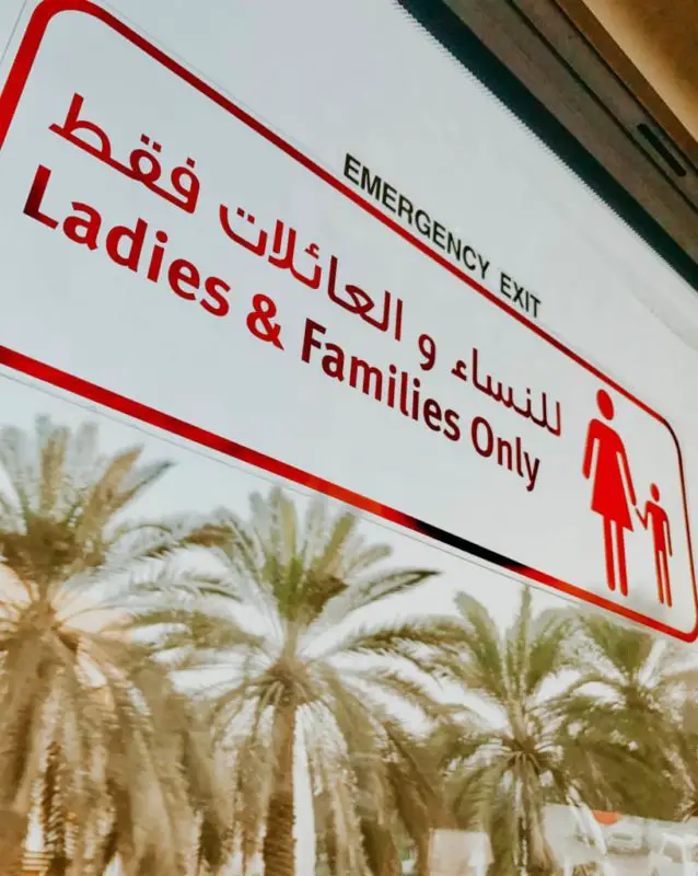 sign I saw that says "Ladies and Families only" on the bus from an abu dhabi day trip from Dubai 