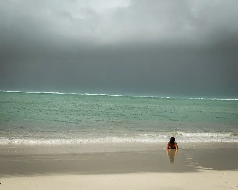 Me lying on a beach in Mauritius a top solo female travel destination