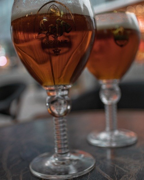 two pints of Belgian beer on a table in Brussels a female solo travel destination