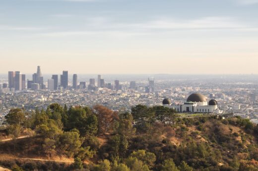 Griffith Observatory captions photo. Aerial view of the Griffith Observatory at sunset.