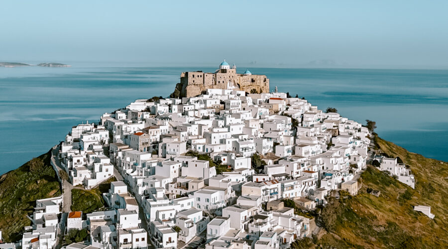 Drone view of the Astypalea castle and windmills one of the top things to do in Astypalea.