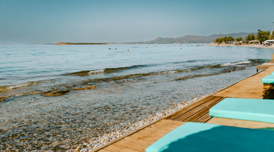 Beach in Agistri with sun beds. One of the best things to do in Agistri.