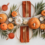 Thanksgiving captions photo of a beautifully decorated table for Thanksgiving.